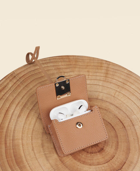Cafuné Stance Pod in Camel with Airpods Pro view