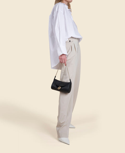 Cafuné Mini Drop Duffel in Black on model view