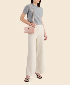 Cafuné Stance Wallet in Blush on model view