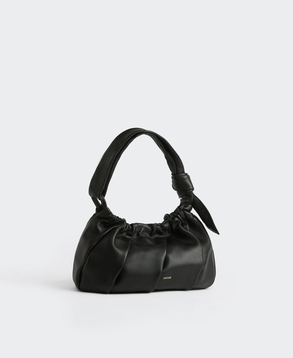 cafune カフネ
Vネックオーバーサイズデニムジャケット Cafuné カフネ - Soft Fold Bag - Black