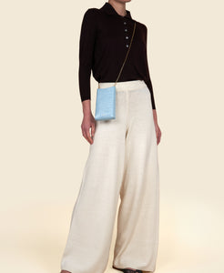 Cafuné Camber Sling in Fluffy on model view