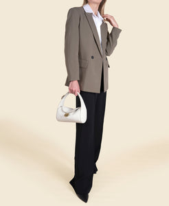 Cafuné Drop Duffel in Ivory on model view